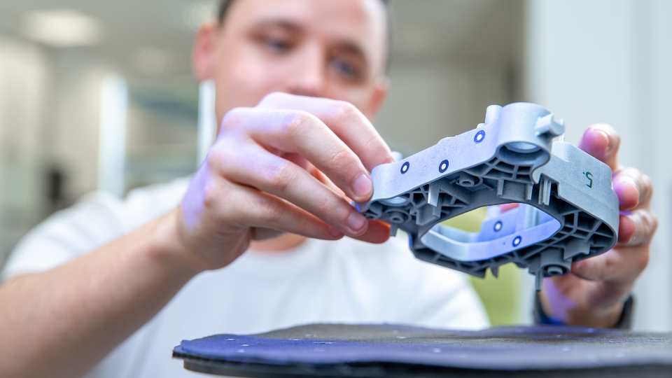 man-inspecting-product-prototype