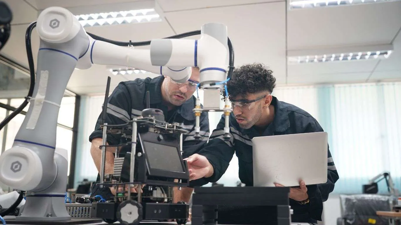 robotics-control-engineers-solve-problems-setting-programming-control-panel-industrial-robot-arm-controller-production-plant_1366